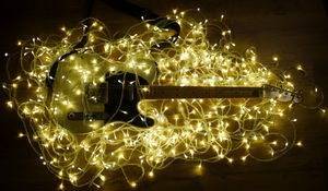 Preview wallpaper electric guitar, guitar, music, garland, glow