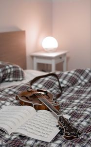 Preview wallpaper electric guitar, guitar, sheet music, lamp, bed, music