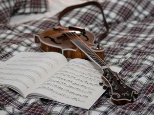 Preview wallpaper electric guitar, guitar, sheet music, lamp, bed, music