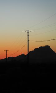 Preview wallpaper electric poles, mountains, silhouettes, nature, dark