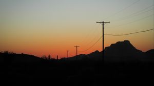 Preview wallpaper electric poles, mountains, silhouettes, nature, dark