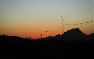 Preview wallpaper electric poles, mountains, silhouettes, nature, dark