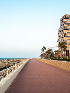 Preview wallpaper embankment, palm trees, coast, city