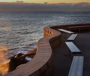 Preview wallpaper embankment, sea, waves, twilight