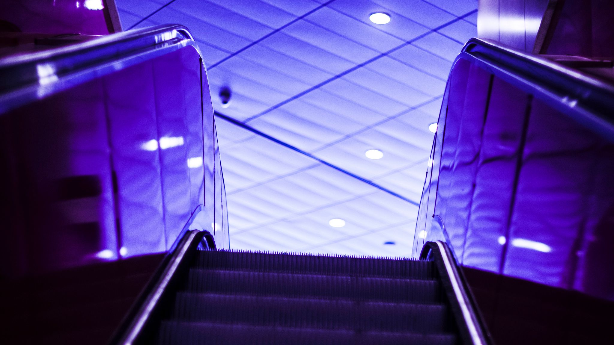 Download wallpaper 2048x1152 escalator, stairs, lights, purple