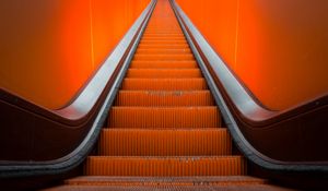 Preview wallpaper escalator, stairs, orange