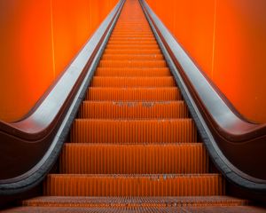 Preview wallpaper escalator, stairs, orange