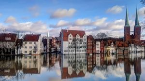 Preview wallpaper europe, buildings, trees, water, reflection, sky, clouds