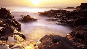 Preview wallpaper evaporation, stony coast, rising, sun, horizon, fog