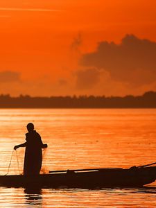 Preview wallpaper evening, decline, orange, person, boat, fishing, networks, outlines