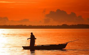 Preview wallpaper evening, decline, orange, person, boat, fishing, networks, outlines