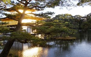 Preview wallpaper evening, japan, mansion, water, garden, trees