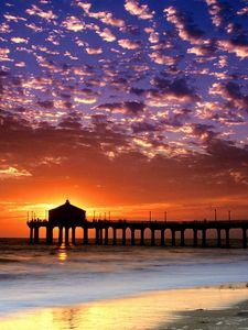 Preview wallpaper evening, sea, pier, decline, sky, coast, sun, clouds, california, beach