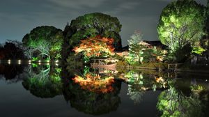 Preview wallpaper evening, trees, light, house, coast, japan, reflection, boat