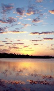 Preview wallpaper evening, water, reflection, lake, ripples, sky, decline, lilac