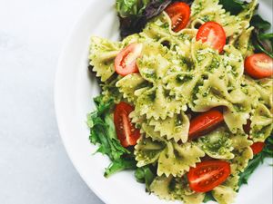 Preview wallpaper farfalle, pasta, salad, sauce, cherry tomatoes