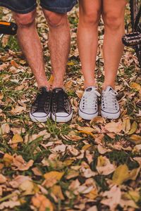 Preview wallpaper feet, autumn, foliage