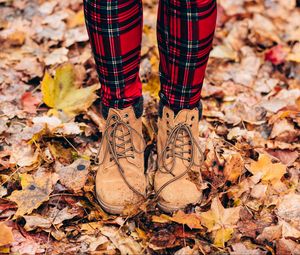 Preview wallpaper feet, autumn, foliage, boots