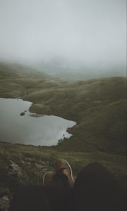 Preview wallpaper feet, lake, fog, hills, slope