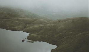 Preview wallpaper feet, lake, fog, hills, slope