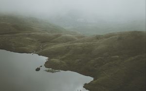 Preview wallpaper feet, lake, fog, hills, slope