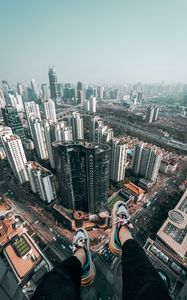 Preview wallpaper feet, roof, skyscrapers, freedom, overview