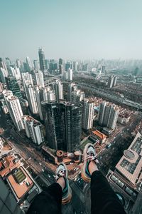 Preview wallpaper feet, roof, skyscrapers, freedom, overview