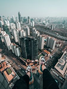 Preview wallpaper feet, roof, skyscrapers, freedom, overview