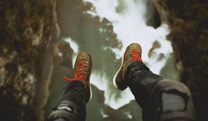 Preview wallpaper feet, shoes, cliff