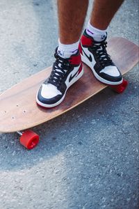 Preview wallpaper feet, skateboard, longboard, sneakers, asphalt