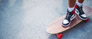 Preview wallpaper feet, skateboard, longboard, sneakers, asphalt