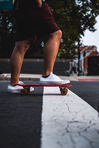 Preview wallpaper feet, skateboard, sneakers, asphalt, hands