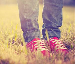 Preview wallpaper feet, sneakers, grass, light, shoes