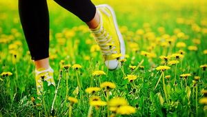 Preview wallpaper feet, sneakers, grass, escape