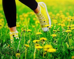 Preview wallpaper feet, sneakers, grass, escape