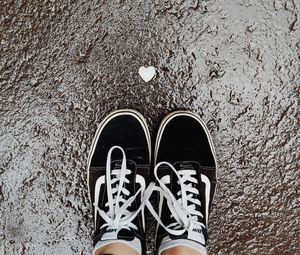 Preview wallpaper feet, sneakers, heart, asphalt, wet