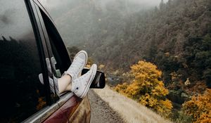 Preview wallpaper feet, sneakers, journey, fog, car