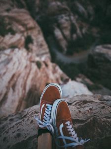 Preview wallpaper feet, sneakers, red, stones, rocks