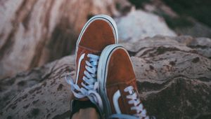 Preview wallpaper feet, sneakers, red, stones, rocks