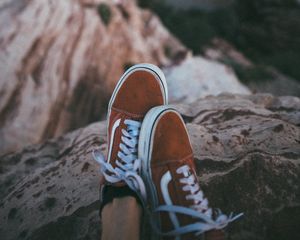 Preview wallpaper feet, sneakers, red, stones, rocks