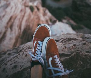 Preview wallpaper feet, sneakers, red, stones, rocks