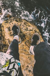 Preview wallpaper feet, stone, wave, surf, foam