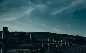 Preview wallpaper fence, flowers, starry sky, night