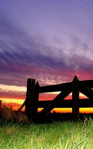 Preview wallpaper fence, grass, evening, sky