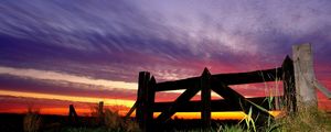 Preview wallpaper fence, grass, evening, sky