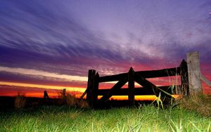 Preview wallpaper fence, grass, evening, sky