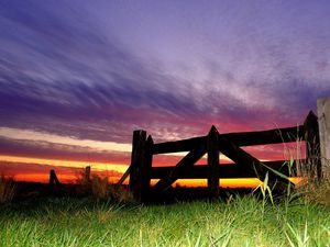 Preview wallpaper fence, grass, evening, sky