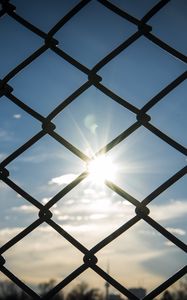 Preview wallpaper fence, grid, sun, light