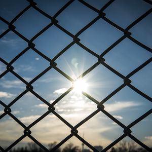 Preview wallpaper fence, grid, sun, light