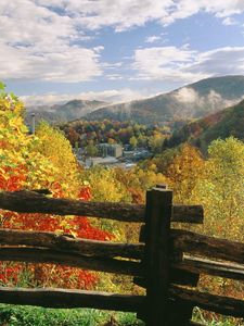 Preview wallpaper fence, logs, autumn, trees, colors